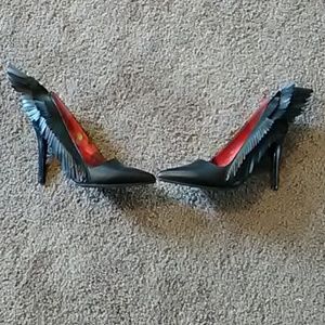High heels with wings